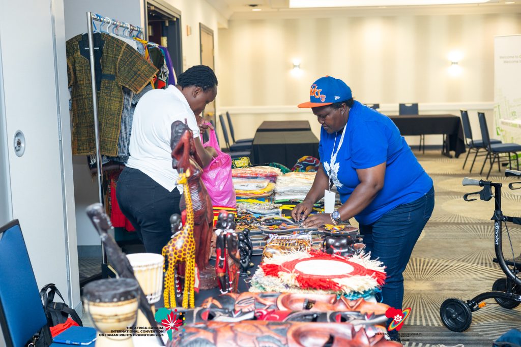 Two women at the ACI exhibition